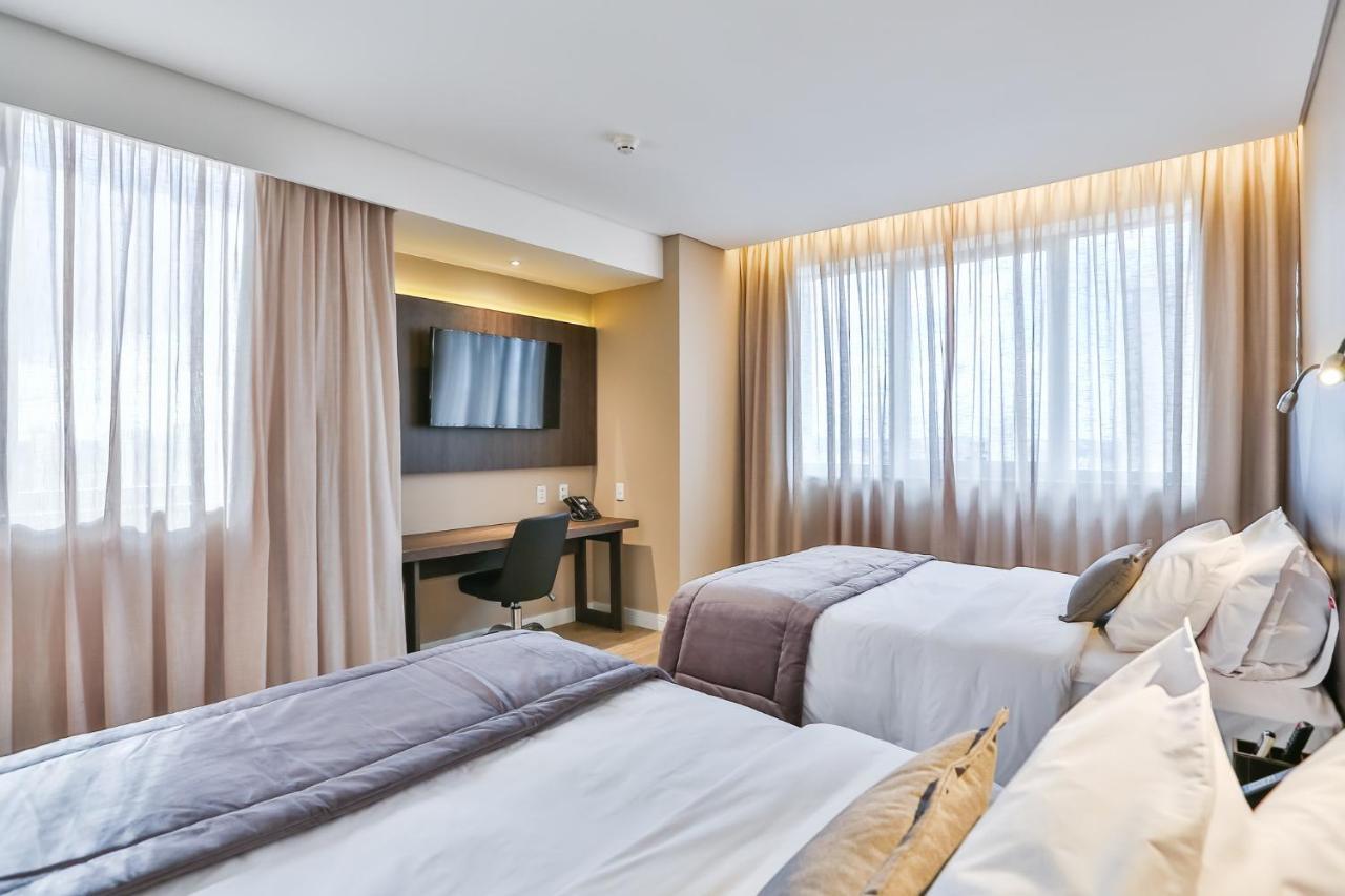 Transamerica Collection กัวยาเนีย ภายนอก รูปภาพ A room at the hotel